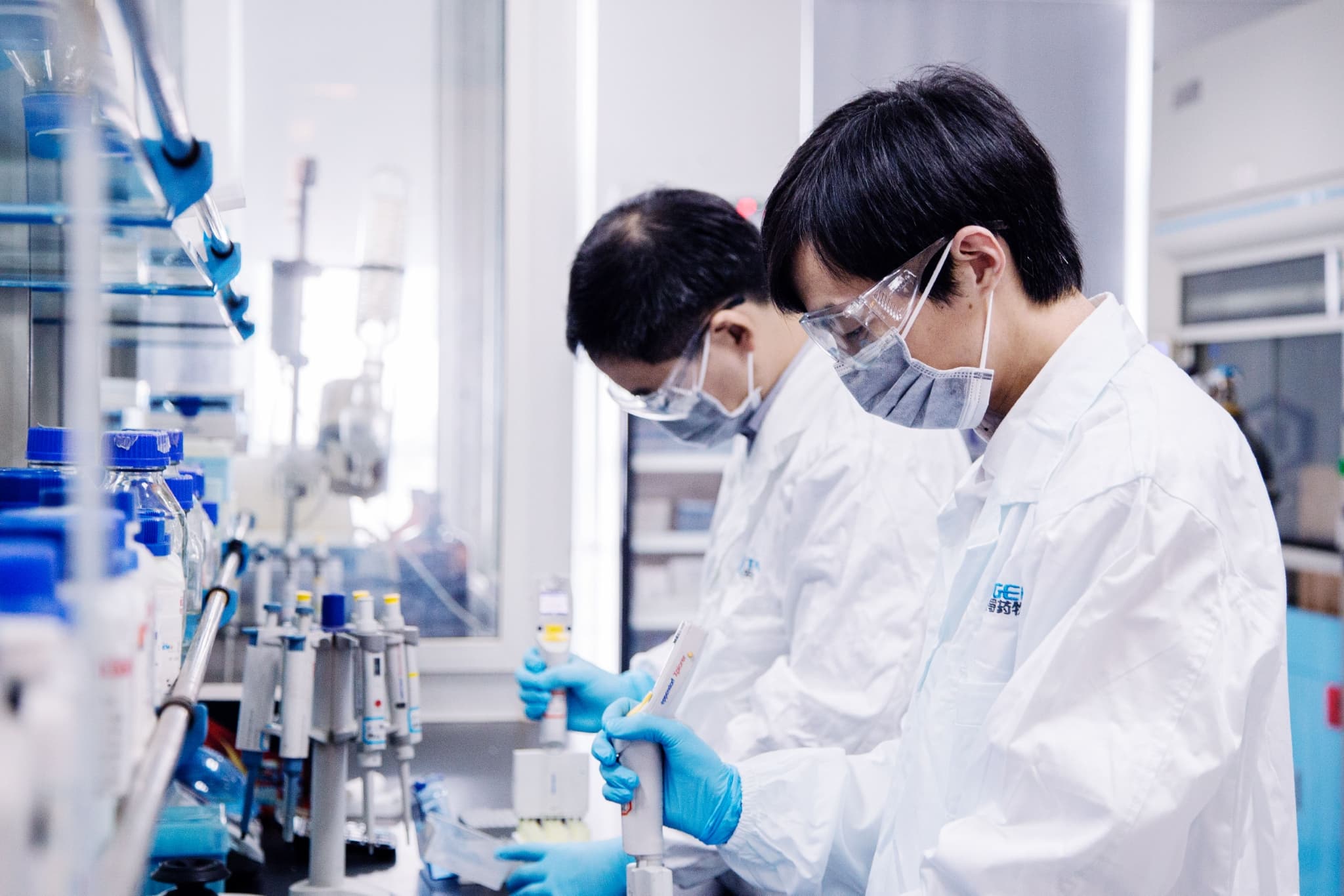 Chinese pharmaceutical researchers developing innovative cancer therapies